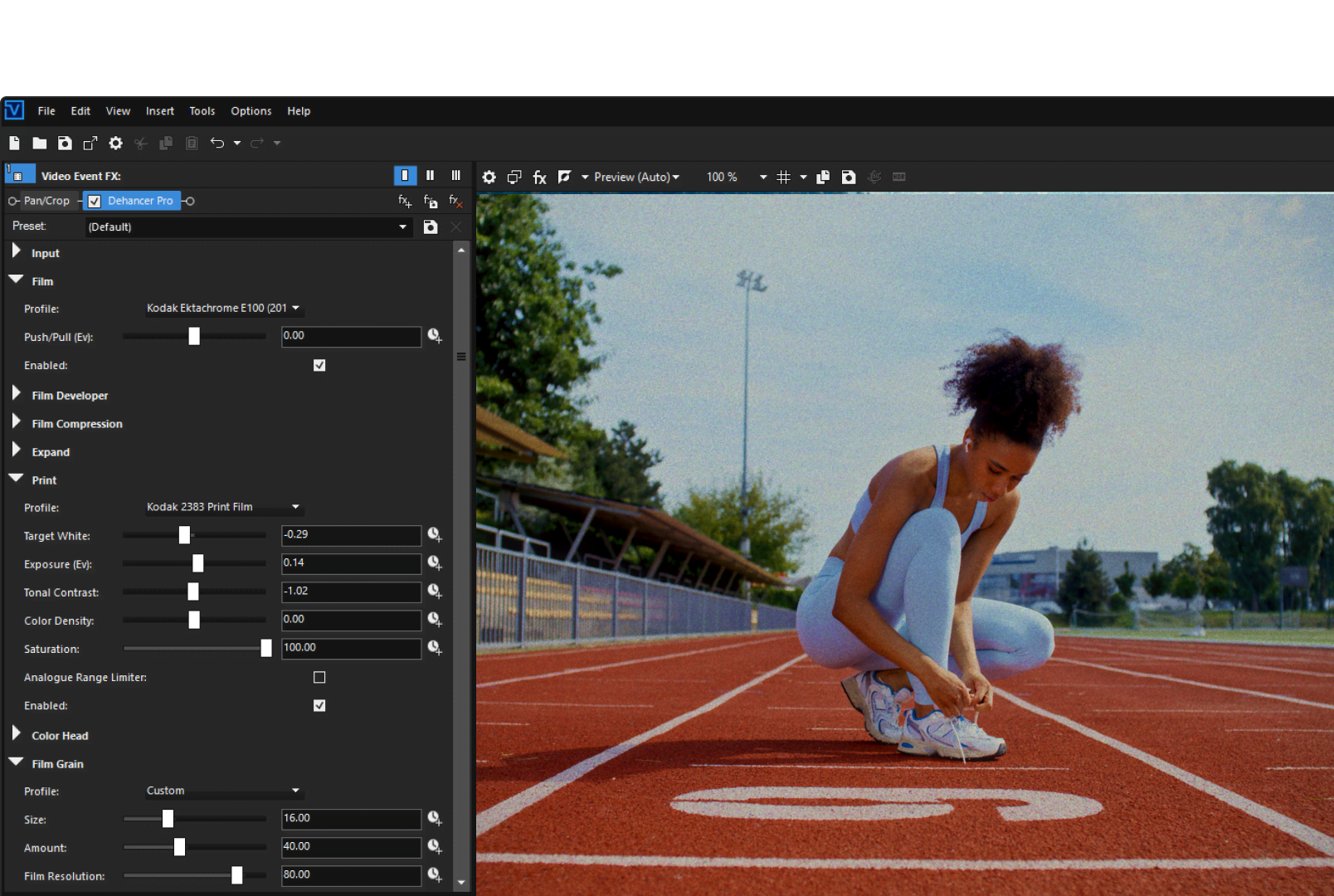 VEGAS Pro editor with the Dehancer plugin open, showing film emulation settings beside a preview of a woman tying her shoe on a red running track